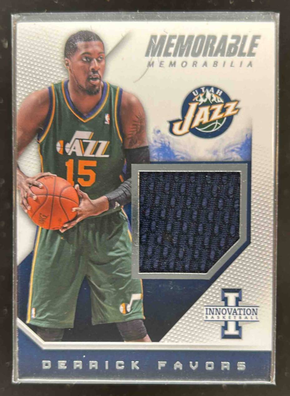 Card image for 2013-14 PANINI INNOVATION DERRICK FAVORS MEMORABLE MEMORABILIA /99 #37 UTAH JAZZ