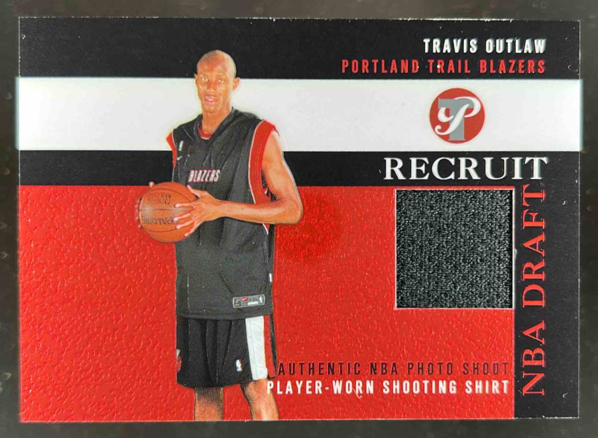 Card image for 2003-04 Topps Pristine Travis Outlaw Recruit Relics #PR-TO MEM RC Rookie