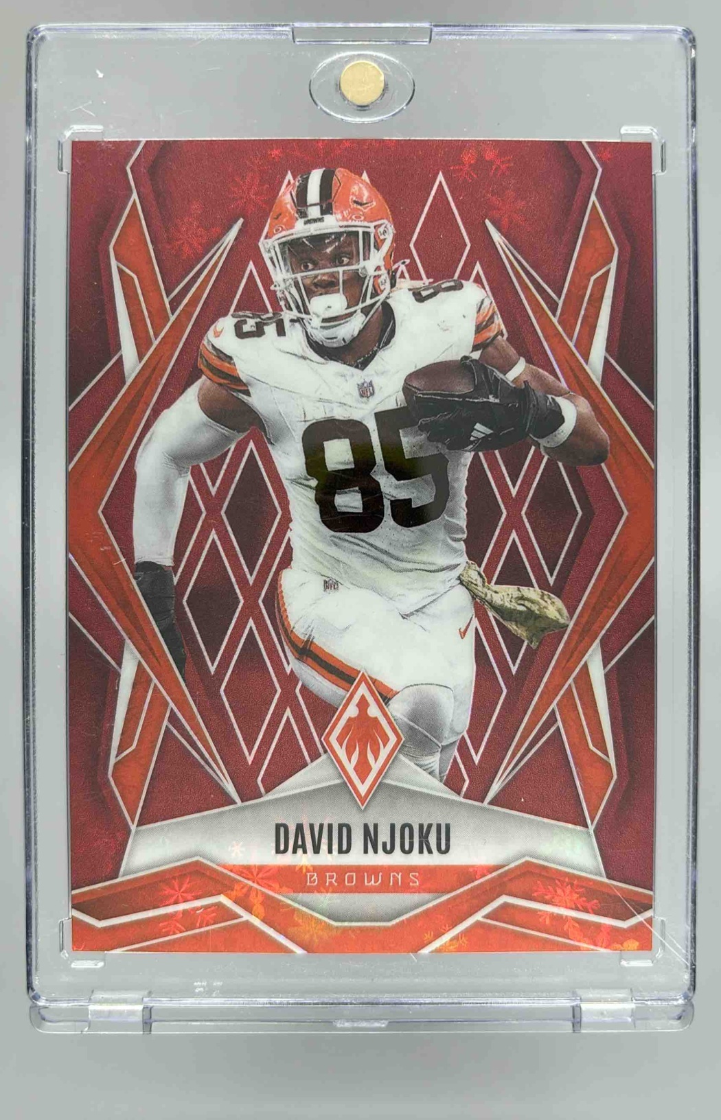 Card image for 2025 Panini Football Phoenix David Njoku Red Winter /399 #110 Cleveland Browns
