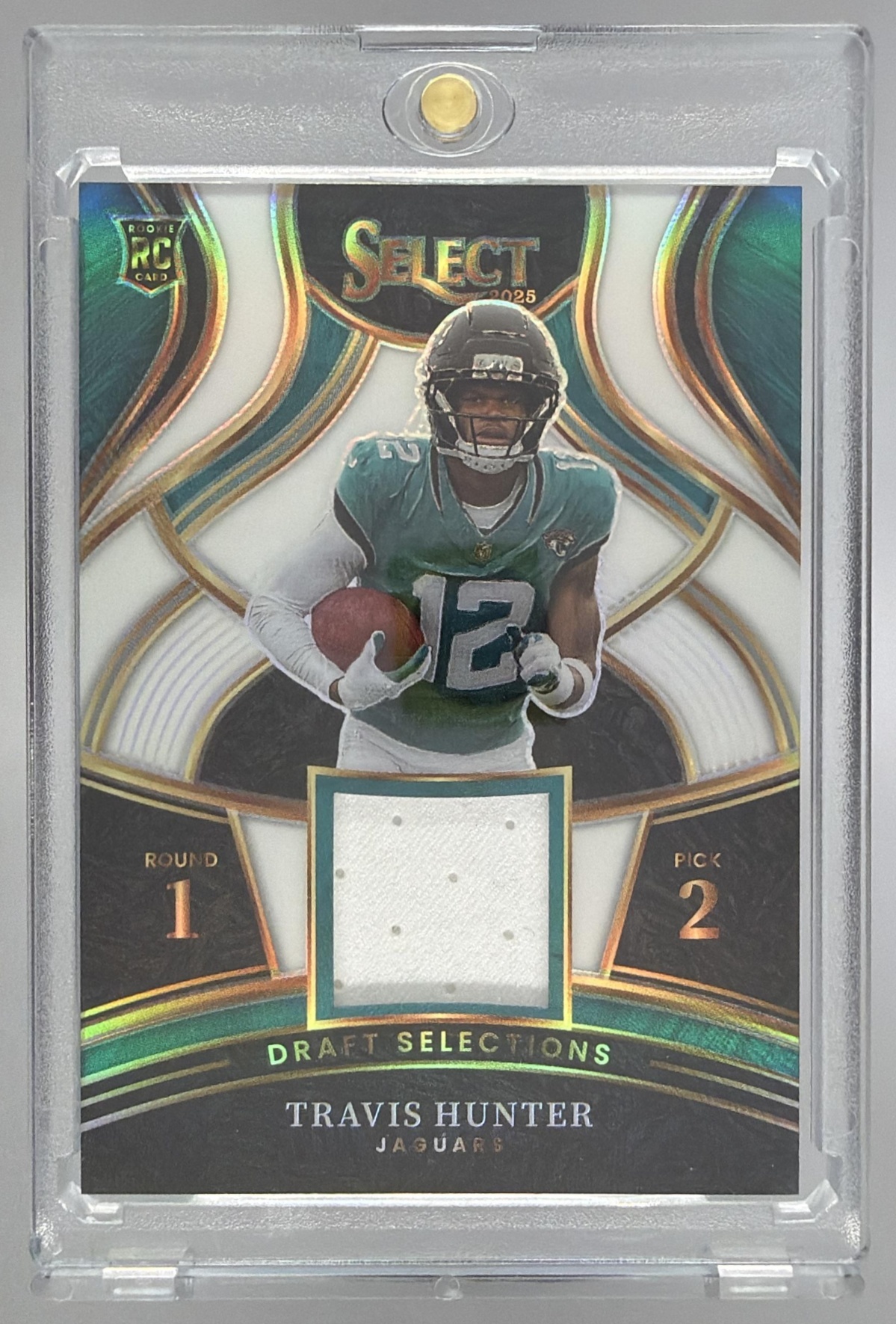 Card image for 2025 Panini Select Travis Hunter Draft Selections Memorabilia White Prizm /99 #DSM-THR MEM RC Jaguars