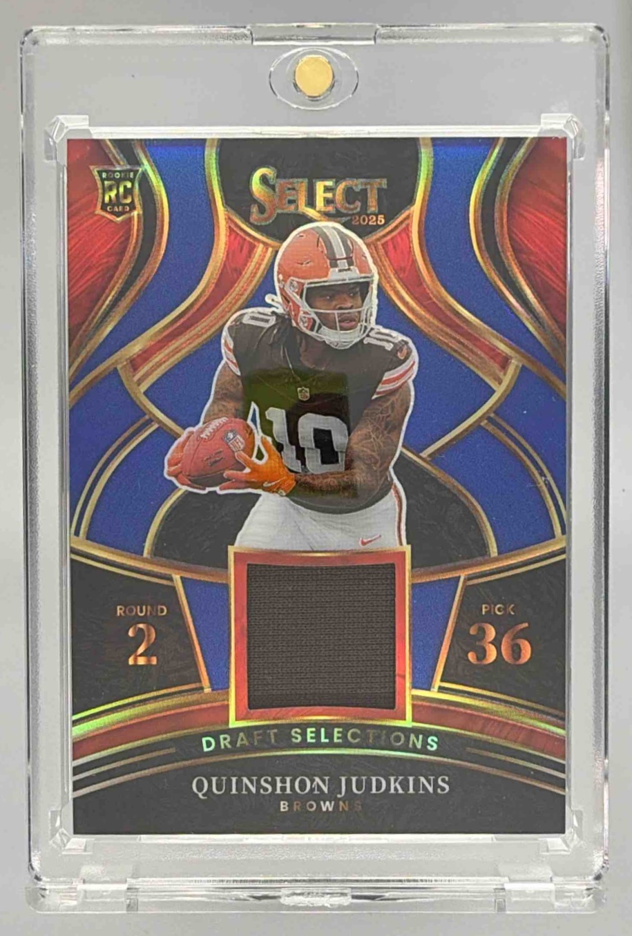 Card image for 2025 Panini Select Quinshon Judkins Draft Selections Memorabilia Blue Prizm #DSM-QJS MEM RC Browns