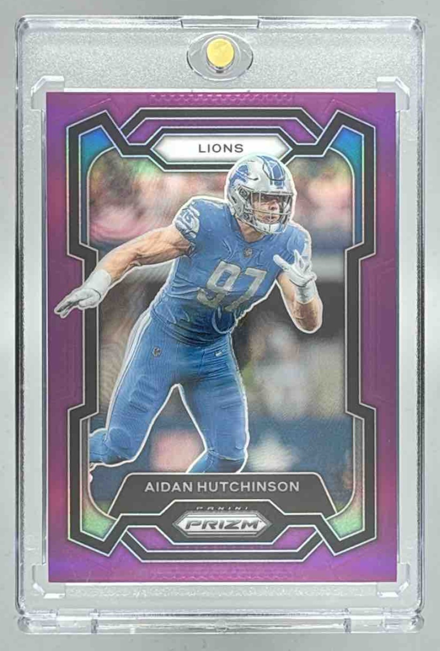 Card image for 2023 Panini Football Prizm Aidan Hutchinson Purple /125 #94 Detroit Lions