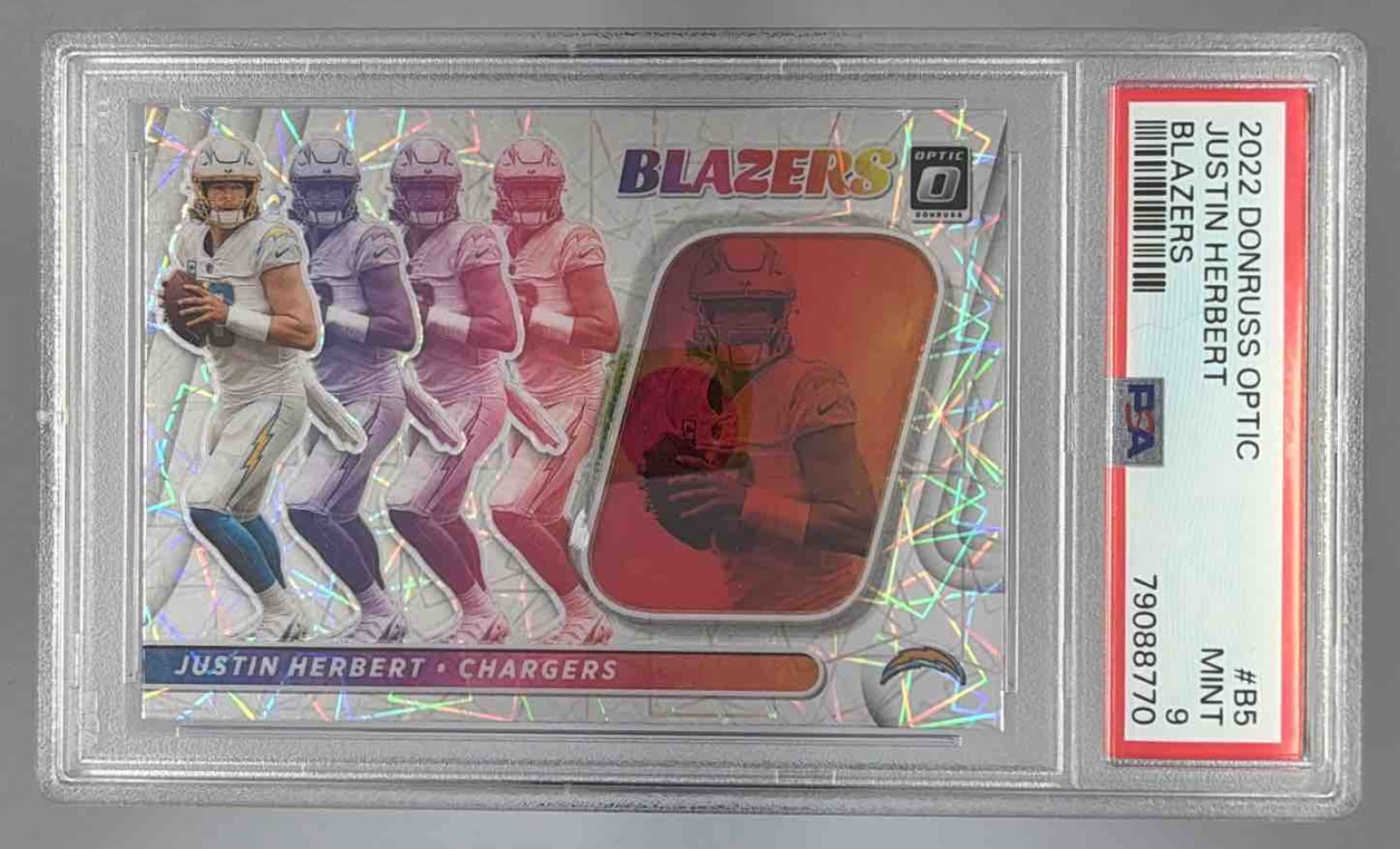 Card image for 2022 Panini Donruss Optic Justin Herbert Blazers #B-5 Chargers