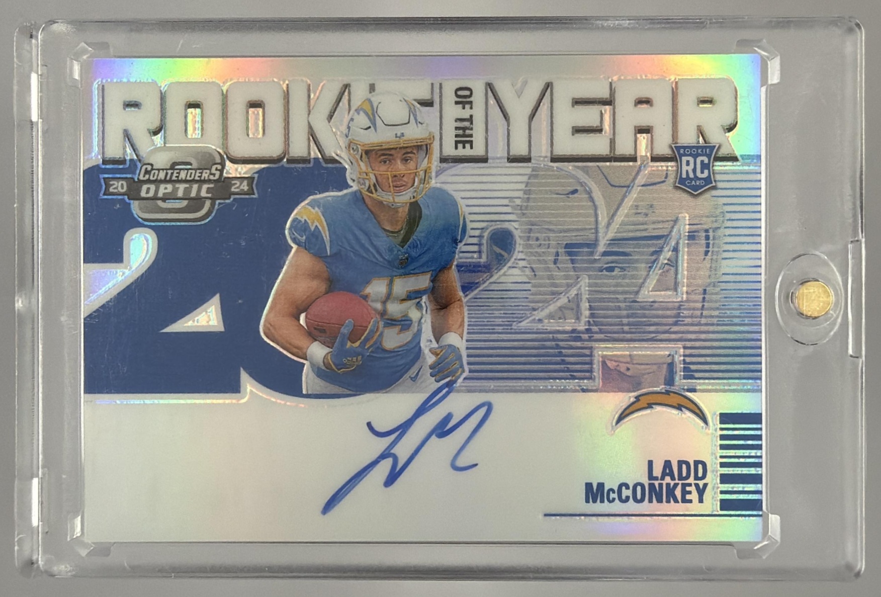 Card image for 2024 Panini Contenders Optic Ladd McConkey Rookie of the Year /99 #ROTY-LMY RC Auto Chargers